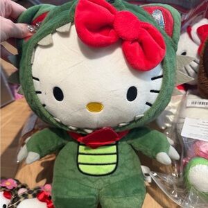 Hello Kitty Plush in Green Dino Outfit with Red Bow